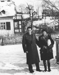 Esther Kac and Leon Lewinstein pose outside in the snow at the Gold Cup displaced persons camp shortly before their marriage.