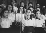 Members of the Dror Zionist youth choir perform at a Hanukkah celebration in the Landsberg displaced persons camp.