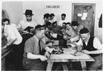 Religious Jews work in an ORT vocational workshop in the Ebelsberg displaced persons' camp.