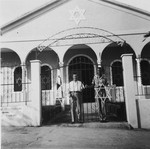 David Bayer, a Jewish DP immigrant from Poland, stands at the gate to a synagogue in Panama City.