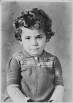 Portrait of four-year-old Alina Peliar taken once her cousin Marie found her after the war.