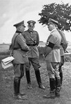 Hitler with the Minister of War Werner von Blomberg and Werner von Fritsch, commander-in-chief of the army, during army maneuvers at the Munster training camp.