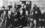 Group portrait of Jewish inmates in the Gurs internment camp taken on the occasion of the golden wedding anniverary of Julius and Emma Wachenheimer.