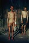 Portrait of two emaciated survivors in the Mauthausen concentration camp.