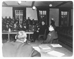 Attorneys listen to testimony during the Dachau concentration camp trial.