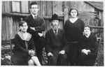 Members of a Jewish family pose outside in Kolbuszowa.