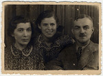 Close-up portrait of a Polish Jewish family in the Lodz ghetto.