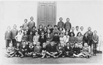 Group portrait of Jewish and non-Jewish children in a public school in Tacovo.