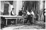 A group of young Jewish men at forced labor in a lumber mill in Gorizia, Italy.