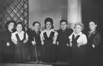 Group portrait of the Ovici family, a family of Jewish dwarf entertainers known as the Lilliput Troupe, who survived Auschwitz.