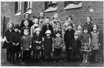 Group portrait of children in Peine, Germany.

Among those pictured is Solly Perel (front row, center).