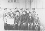 Group portrait of children and teachers in a Vaad Hatzala "yeshiva ketana" (elementary grade religious school).