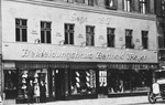 The Meyer family stands in front of Berthold Meyer's clothing store in Breslau Germany.
