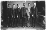 Joseph Diament (second from the right), the owner of a tailor shop in Copenhagen, poses with five of his co-workers.