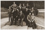 Jewish youth pose with their counselors in the yard of the Rothschild's Château Ferrière, where they are attending a summer camp sponsored by the OSE (Oeuvre de secours aux Enfants).