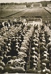Adolf Hitler addresses the crowd assembled in the Luitpoldhain during Reichsparteitag (Reich Party Day) ceremonies.