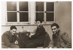 Emissaries from Palestine sent by the Haganah listen to a radio broadcast of the UN partition vote in the Bergen-Belsen displaced persons camp.