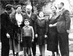 Members of the extended Baruch family pose outside one of their homes in Sofia, Bulgaria.