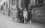 A German-Jewish family poses outside their home in Oberwesel.