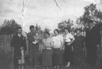 Group portrait of members of the extended Altarac family outside their home in Vlasenica, Bosnia.