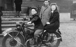 Moniek and Lusia Gliklich ride a motorcycle in the Schlachtensee displaced persons camp.
