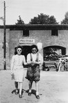 Lusia Gliklich (left) and Mina Cymmerman walk in front of the ORT school at the Schlachtensee displaced persons camp.