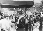 U.S. Army chaplain Mayer Abramowitz officiates at a wedding ceremony for displaced persons at Kibbutz Buchenwald in Geringshof.