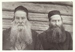Portrait of the two Moszczenik brothers  

(Right to left), Reb Dovid "der Kichier" and "Reb Zvi-Hersh the Garden Preacher."  He earned his nickname since he spoke to his vegetable garden every day.