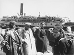 Exodus 1947 refugees wait to board the President Warfield on a quay in Sete's harbor.