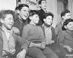 Jewish orphans laugh during a performance at the Lindenfels displaced person's center for children.