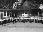 Group portrait of the children and teachers of the Lindenfels displaced persons' center for children.