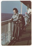 Sarah Spiegel Robinson poses on the deck of  the ship taking bringing her to the United States.