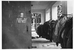 View of clothing hanging outside the gas chamber in the Dachau concentration camp.