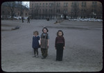 Three young girls pose at the Bamberg displaced person's camp (Uhlan barracks) in Germany.