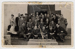 Group portrait of Jews in a Hungarian forced labor battalion, perhaps in Zircz.