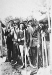 Group portrait of Jews at forced labor building a road in Kolbuszowa.