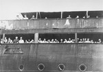Jewish refugees aboard the MS St. Louis attempt to communicate with friends and relatives in Cuba, who were permitted to approach the docked vessel in small boats.