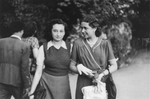Two Jewish female friends walk in a park in Bucharest just after the liberation.