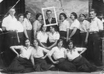Group of Jewish young women and men wearing white shirts in Macedonia.