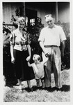 A Jewish refugee family poses outside their new home in Kenya shortly after their arrival from Holland.
