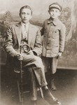 Studio portrait of two Jewish brothers in Brody, Poland.