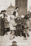Friedel Reiter greets children as they arrive to the nursery school at the Rivesaltes internment camp.