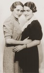 Studio portrait of two young Jewish women.

Pictured are Czeslava (Harmelin) Sauber (left) and Toni (Auerbach) Zimon.