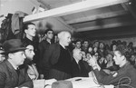 David Ben-Gurion, Chairman of the Jewish Agency Executive, delivers a speech at a public forum during an official visit to the Zeilsheim displaced persons camp.