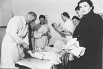 Mothers bring their infants for an examination in the baby clinic of the hospital in the Zeilsheim displaced persons' camp.