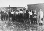 Jewish DP youth line up behind a child with a drum in the Zeilsheim displaced persons camp.