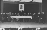 Yitzhak Gruenbaum delivers a speech at a Zionist meeting during his visit to the Zeilsheim displaced persons camp.