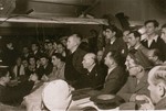 David Ben-Gurion, Chairman of the Jewish Agency, attends a public meeting during his visit to Zeilsheim displaced persons camp.