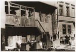 Household furnishings line the courtyard outside Jewish homes in the ghetto.