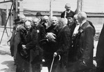 A group of elderly Jewish men from Subcarpathian Rus who have been selected for death, wait to be taken to the gas chambers.